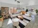 Bright and airy living room with modern furniture, stylish decor, and plenty of natural light at 30271 W Crittenden Ln, Buckeye, AZ 85396