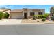 Charming single-Gathering home featuring a desert-landscaped front yard and an attached two-car garage at 3531 N Sericin --, Mesa, AZ 85215