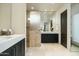 Charming bathroom featuring tiled shower with glass enclosure and modern vanity at 41611 N 113Th Pl, Scottsdale, AZ 85262