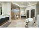 Luxurious bathroom with double vanity, soaking tub, walk-in shower, and modern fixtures at 41611 N 113Th Pl, Scottsdale, AZ 85262
