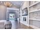 Bedroom featuring a decorative chandelier, fireplace, and built-in shelving at 5220 N Casa Blanca Dr, Paradise Valley, AZ 85253