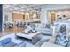 A stylish open plan connects a gorgeous living space to the gourmet kitchen and breakfast area at 5220 N Casa Blanca Dr, Paradise Valley, AZ 85253