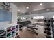 Well-equipped fitness center with dumbbells, weight benches and other exercise equipment at 5450 E Deer Valley Dr # 1201, Phoenix, AZ 85054