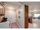 Hallway featuring built-in cabinets and view to the living space at 5450 E Deer Valley Dr # 1201, Phoenix, AZ 85054