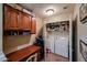 This laundry room has a washer and dryer, storage, and cabinets, offering convenience and organization at 5450 E Deer Valley Dr # 1201, Phoenix, AZ 85054