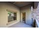 This outdoor patio features stone accents and a view of the exterior buildings at 5450 E Deer Valley Dr # 1201, Phoenix, AZ 85054