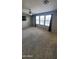 Spacious bedroom with plush carpet, neutral paint, and a ceiling fan at 5734 W Gwen St, Laveen, AZ 85339