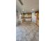 Updated kitchen with ample counter space, central island, wooden cabinets, and modern appliances at 5734 W Gwen St, Laveen, AZ 85339