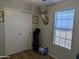 Bedroom with wood-look floors, ceiling fan, and slider closet doors for organized storage at 7300 N 51St Ave # A259, Glendale, AZ 85301