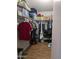 Organized walk-in closet featuring ample shelving and hanging space at 7300 N 51St Ave # A259, Glendale, AZ 85301