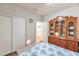 Bright bedroom with closet, large hutch and doorway to bathroom at 7433 W Darrel Rd, Laveen, AZ 85339
