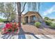 Lovely single-story home featuring desert landscaping, covered entryway, and attached garage at 7433 W Darrel Rd, Laveen, AZ 85339
