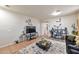 Welcoming living room features a modern decor, tiled floors, and stylish furniture at 7433 W Darrel Rd, Laveen, AZ 85339