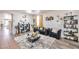 Bright and open living room with stylish seating, modern decor, and a welcoming ambiance at 7433 W Darrel Rd, Laveen, AZ 85339