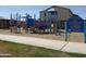 Community playground area with colorful play structures and safety surfacing at 7433 W Darrel Rd, Laveen, AZ 85339