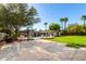 Spacious backyard with a pool, basketball court, and lush green lawn at 8031 N 12Th Ave, Phoenix, AZ 85021