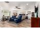 Spacious main bedroom with carpeted floor, ceiling fan, and natural light at 8031 N 12Th Ave, Phoenix, AZ 85021