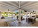 Outdoor living space with ping pong table, dining area, and views of the pool and spa at 8031 N 12Th Ave, Phoenix, AZ 85021
