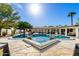 Inviting backyard pool and spa featuring a covered outdoor kitchen and multiple seating areas at 8031 N 12Th Ave, Phoenix, AZ 85021