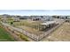 Overhead view of the property highlighting the horse corral, white fencing, and ample space at 8429 S 229Th Ln, Buckeye, AZ 85326