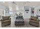 Cozy living room featuring comfortable seating, tile flooring, and an open concept layout at 8429 S 229Th Ln, Buckeye, AZ 85326