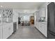 Open floorplan combining kitchen and dining areas, featuring modern finishes and natural light at 8429 S 229Th Ln, Buckeye, AZ 85326
