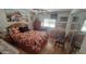 Cozy bedroom featuring warm tones and a relaxing atmosphere at 8609 E Dewberry Ave, Mesa, AZ 85208