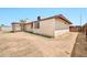 Exterior view of the home, showcasing its design and backyard at 9102 N 56Th Ln, Glendale, AZ 85302