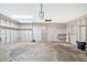 Spacious garage interior with storage shelves and ample room for vehicles at 9102 N 56Th Ln, Glendale, AZ 85302