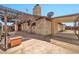 Covered patio providing a shady spot for outdoor entertaining and leisure at 9102 N 56Th Ln, Glendale, AZ 85302