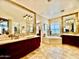 Luxurious bathroom with a soaking tub, dual sinks, and vanity, providing a spa-like retreat at 9249 E Desert Arroyos St, Scottsdale, AZ 85255
