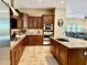 Gourmet kitchen with stainless appliances, granite countertops and custom cabinets at 9249 E Desert Arroyos St, Scottsdale, AZ 85255