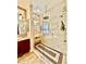 Spa-like shower featuring elegant tile work, bench, and glass enclosure at 9249 E Desert Arroyos St, Scottsdale, AZ 85255
