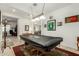 Open game room featuring pool table, neutral walls and tile floors at 9390 W Louise Dr, Peoria, AZ 85383