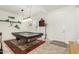 Spacious game room with a pool table, overhead lighting, and decor at 9390 W Louise Dr, Peoria, AZ 85383