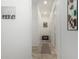 Hallway featuring neutral walls and tile flooring at 9390 W Louise Dr, Peoria, AZ 85383