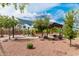 Community playground offers covered play structures, a picnic pavilion, and open space under a partly cloudy sky at 9390 W Louise Dr, Peoria, AZ 85383