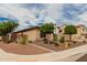Residential neighborhood with homes featuring desert landscaping and well-maintained exteriors at 9390 W Louise Dr, Peoria, AZ 85383