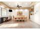 Community dining room with a large wooden table and multiple chairs at 13450 E Via Linda St # 1019, Scottsdale, AZ 85259