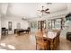 A well-lit community game room, featuring a billiards table and various seating options at 13450 E Via Linda St # 1019, Scottsdale, AZ 85259