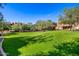 Expansive green space surrounded by trees and views of the nearby residences at 13450 E Via Linda St # 1019, Scottsdale, AZ 85259