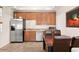 A well-equipped kitchenette with stainless steel appliances and ample counter space at 13450 E Via Linda St # 1019, Scottsdale, AZ 85259