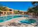 Beautiful community pool and spa with lounge chairs for relaxing in the sun at 13450 E Via Linda St # 1019, Scottsdale, AZ 85259