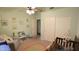 Comfortable Bedroom with a crib, chair and neutral decor at 520 E Appaloosa Rd, Gilbert, AZ 85296