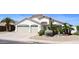 Beautiful single-story house featuring a two-car garage, desert landscaping, and a well-kept front yard at 520 E Appaloosa Rd, Gilbert, AZ 85296