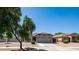 Beautiful single-story home with desert landscaping, a two-car garage, and a serene front yard at 6092 S Bridal Vail Dr, Gilbert, AZ 85298