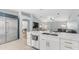 Kitchen island with stainless steel sink opens to the living area at 6092 S Bridal Vail Dr, Gilbert, AZ 85298