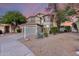 Charming two-story home featuring desert landscaping and a two car garage in a residential neighborhood at 18103 W Canyon Ln, Goodyear, AZ 85338