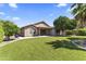 Backyard features new turf, desert landscaping, and a covered patio perfect for entertaining at 2453 E Nathan Way, Chandler, AZ 85225