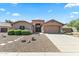 Charming single-story home featuring a well-manicured front yard and inviting entrance at 2453 E Nathan Way, Chandler, AZ 85225